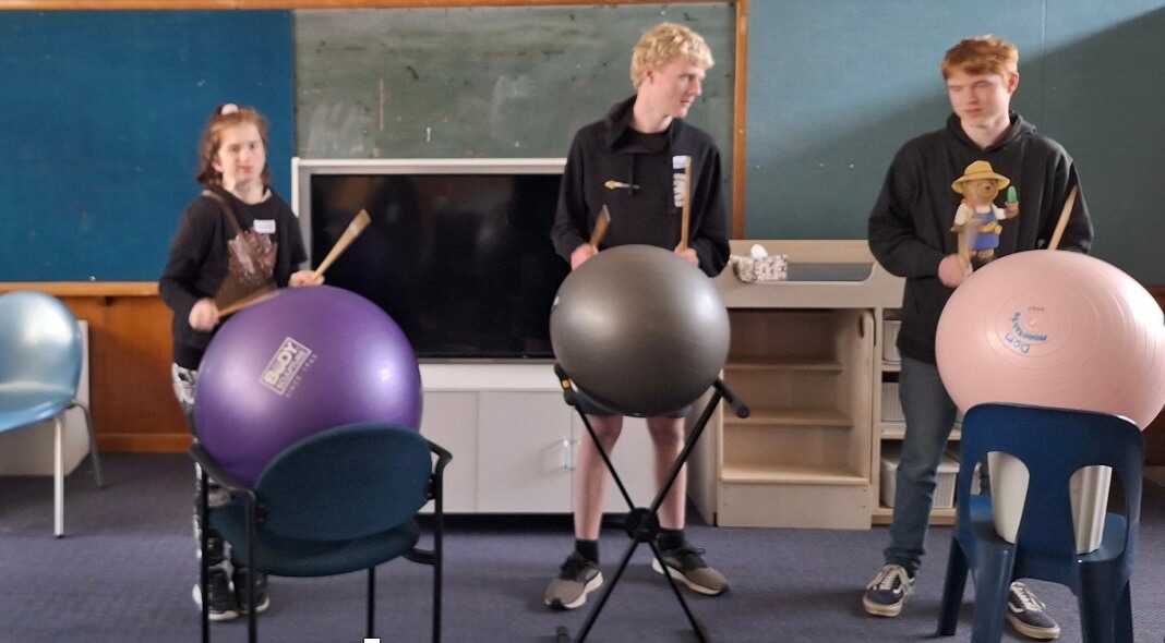 Akonga participating in Swiss Ball Drumming