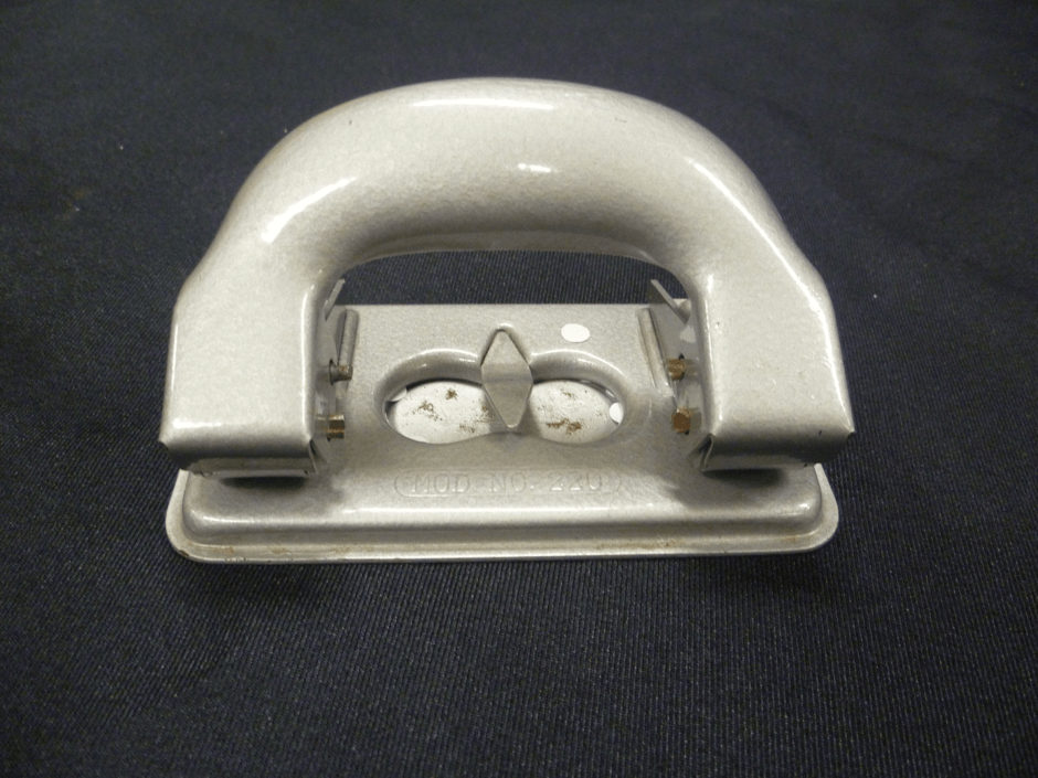 Metal two hole paper punch.